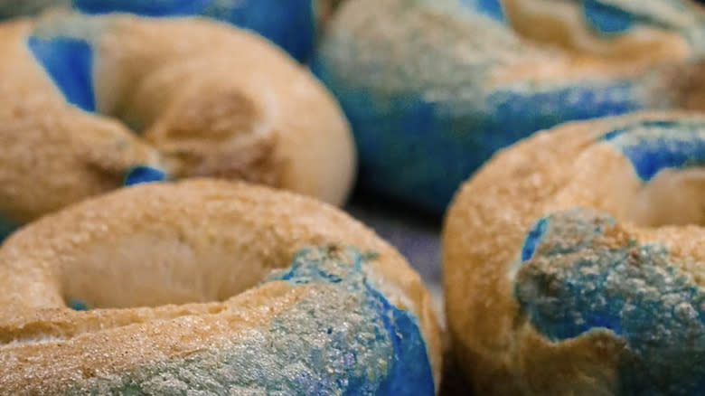 Blue bagels on counter