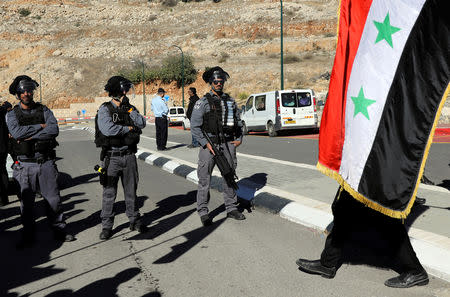 Druze Arabs on the Israeli-occupied Golan Heights hold an anti-election protest outside a municipal polling station in Majdal Shams, October 30, 2018 REUTERS/Ammar Awad