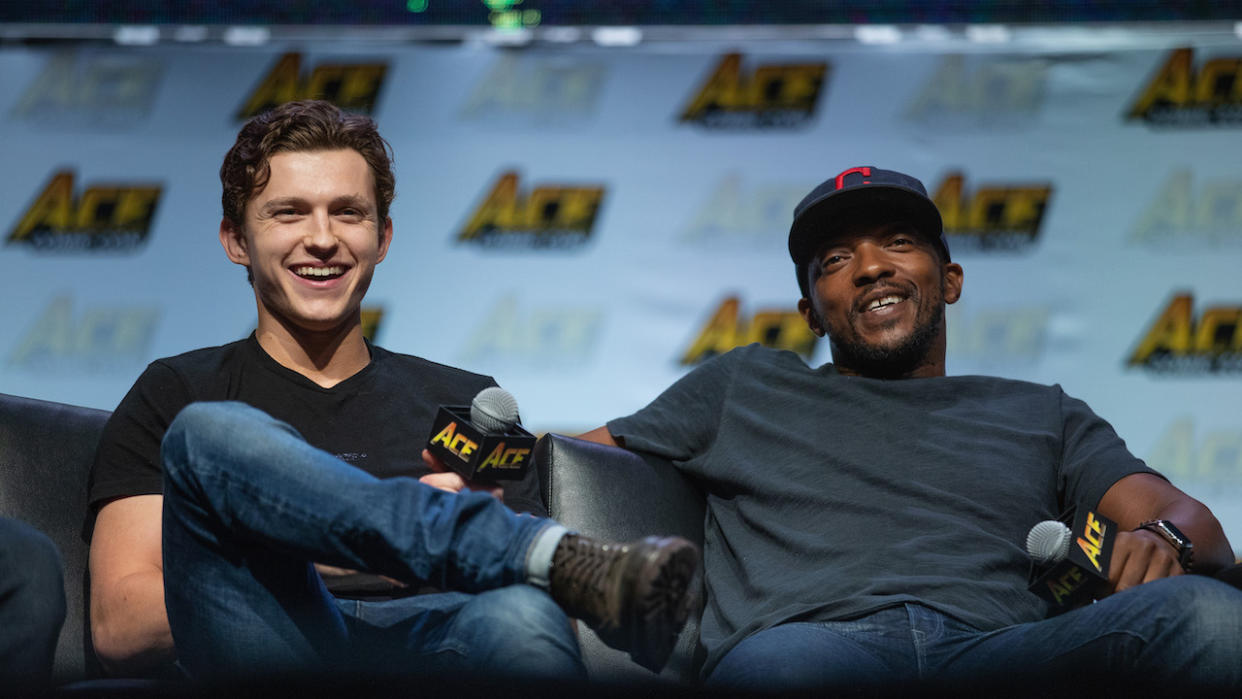  Anthony Mackie and Tom Holland laughing at ACE Comic Con in 2018 . 