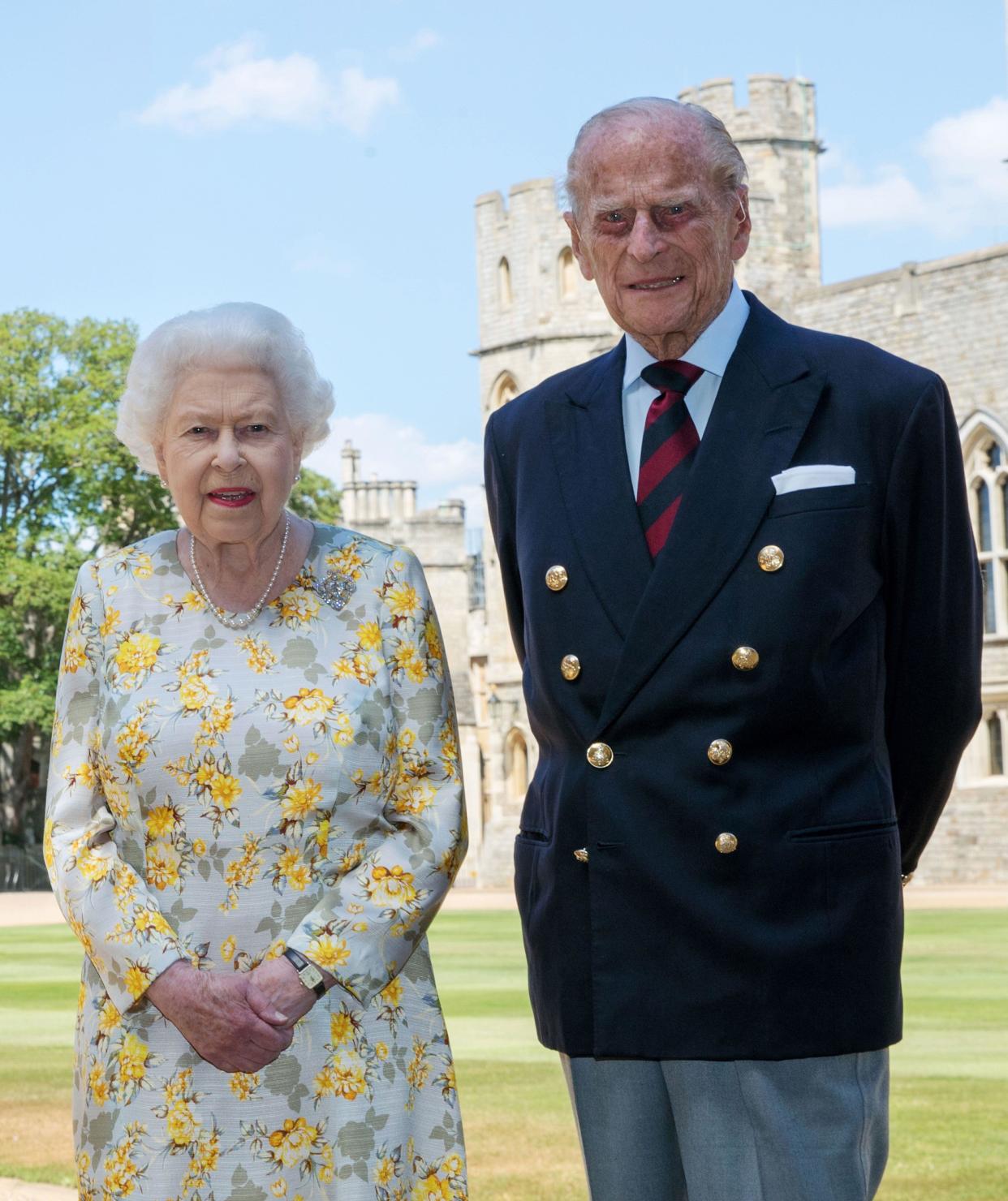 PA REVIEW OF THE YEAR 2020 File photo dated 01/06/20 of Queen Elizabeth II and the Duke of Edinburgh pictured in the quadrangle of Windsor Castle ahead of his 99th birthday on Wednesday June 10.