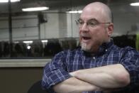 In this Dec. 4, 2019, photo Director of public affairs Avi Stern answers a question at Rosendale Dairy in Pickett, Wis. At Rosendale Dairy, each of the 9,000 cows has a microchip implanted in an ear that workers can scan with smartphones for up-to-the-minute information on how the animal is doing, everything from their nutrition to their health history to their productivity. (AP Photo/Morry Gash)