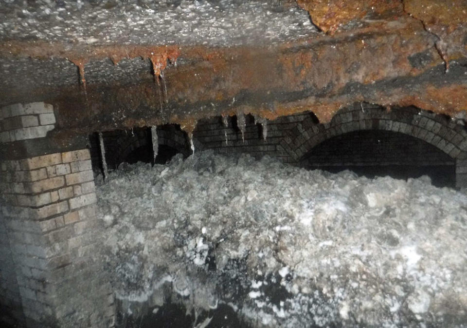 The 64-metre-long mass of hardened fat, oil, and wet wipes has been discovered in drains in Sidmouth (Picture: PA)