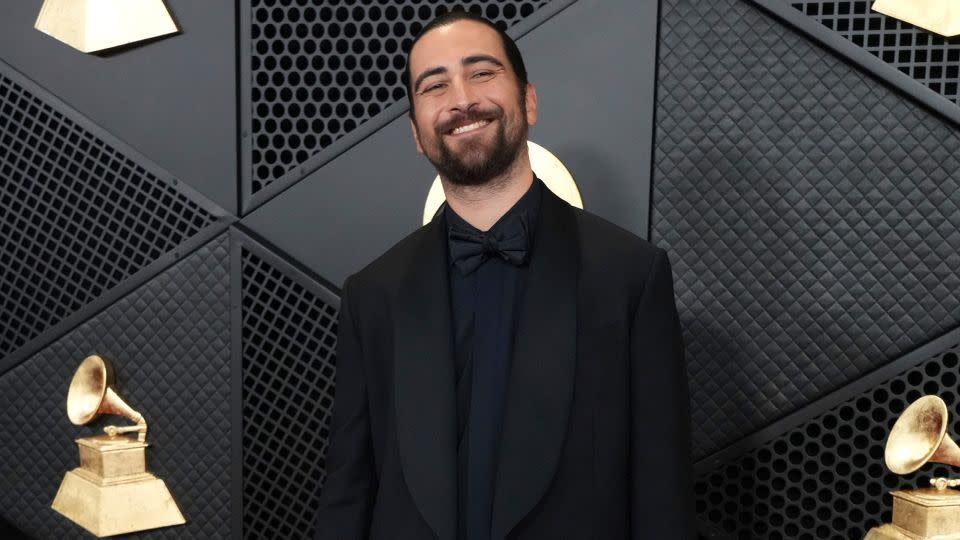 Noah Kahan, nominated in the Best New Artist category, opted for an all-black tuxedo. - Jordan Strauss/Invision/AP