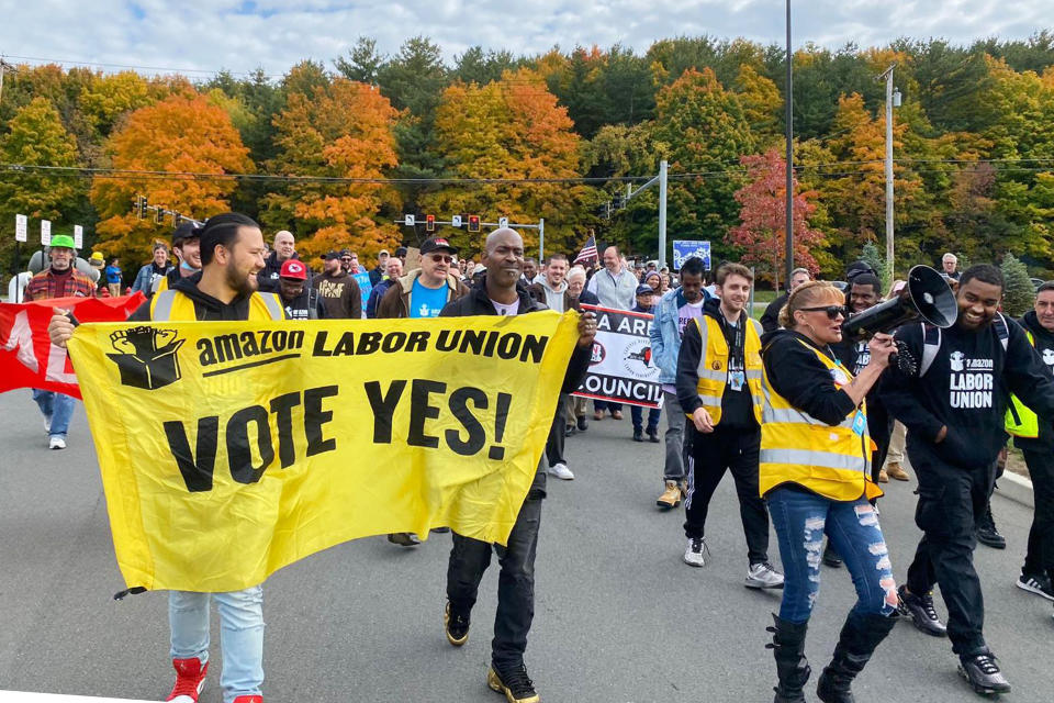 Amazon workers and supporters march during a rally in Castleton-On-Hudson, about 15 miles south of Albany, N.Y., Monday, Oct. 10, 2022. The startup union that clinched a historic labor victory at Amazon earlier this year is slated to face the company yet again, aiming to rack up more wins that could force the reluctant retail behemoth to the negotiating table. (Rachel Phua via AP)