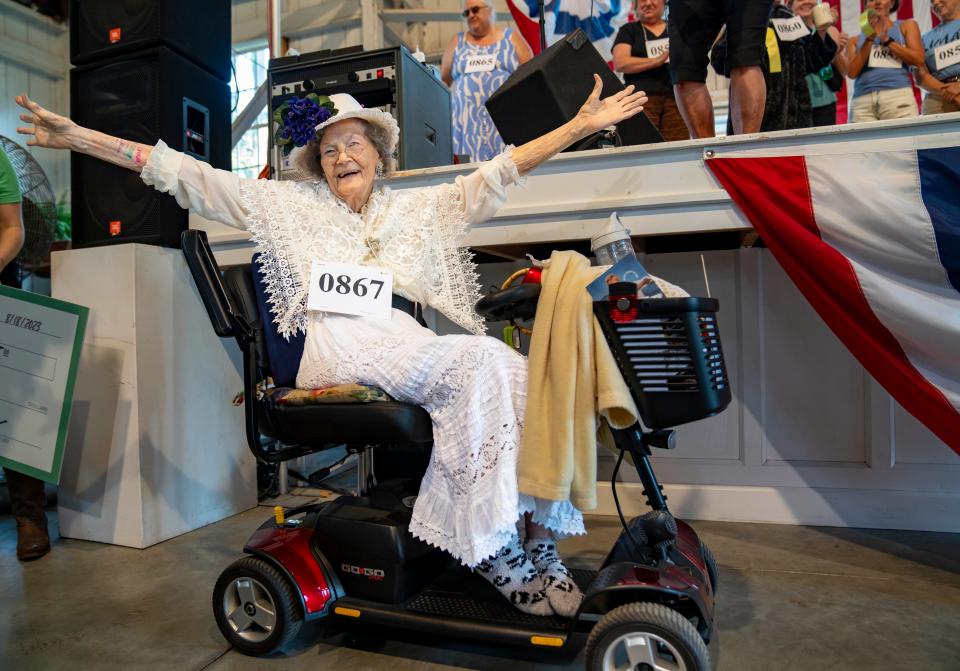 Bonnie Eilert, 95, wins in the Husband Calling Contest at the Iowa State Fair, Friday, Aug. 18, 2023.