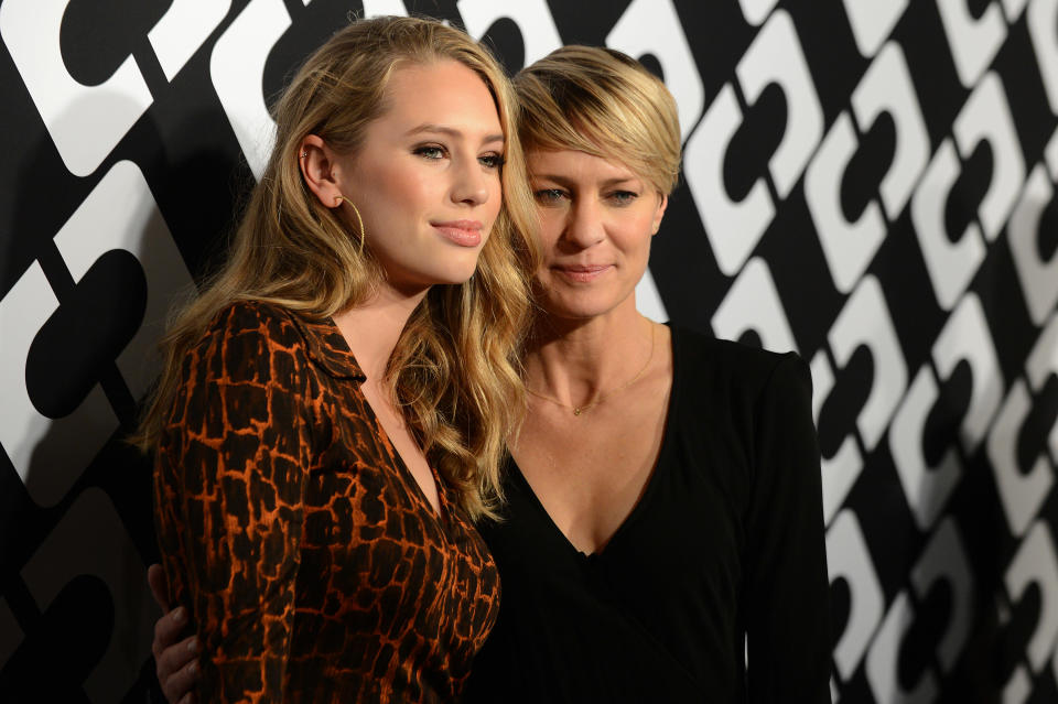 Dylan Penn, left, and Robin Wright attend the DVF Journey of a Dress 40th Anniversary Party at Wilshire May Company Building on Jan. 10, 2014 in Los Angeles.(Photo by Jordan Strauss/Invision/AP)