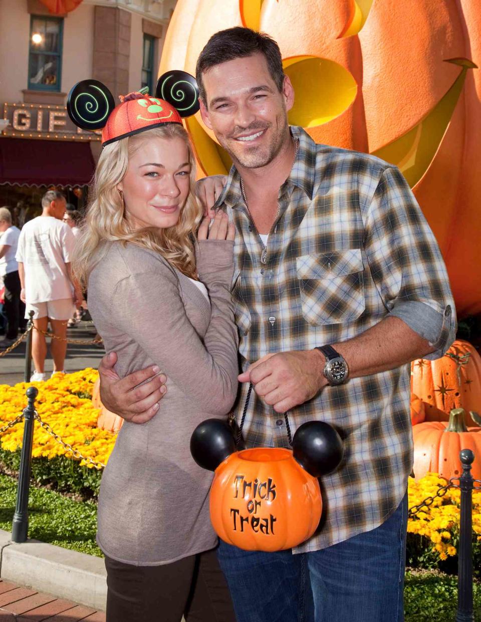 LeAnn Rimes and Eddie Cibrian celebrate Halloween Time at Disneyland on October 8, 2010 in Anaheim, California. The Disneyland Resort's Halloween Time celebration, which features special attractions and entertainment, continues through October 31, 2010