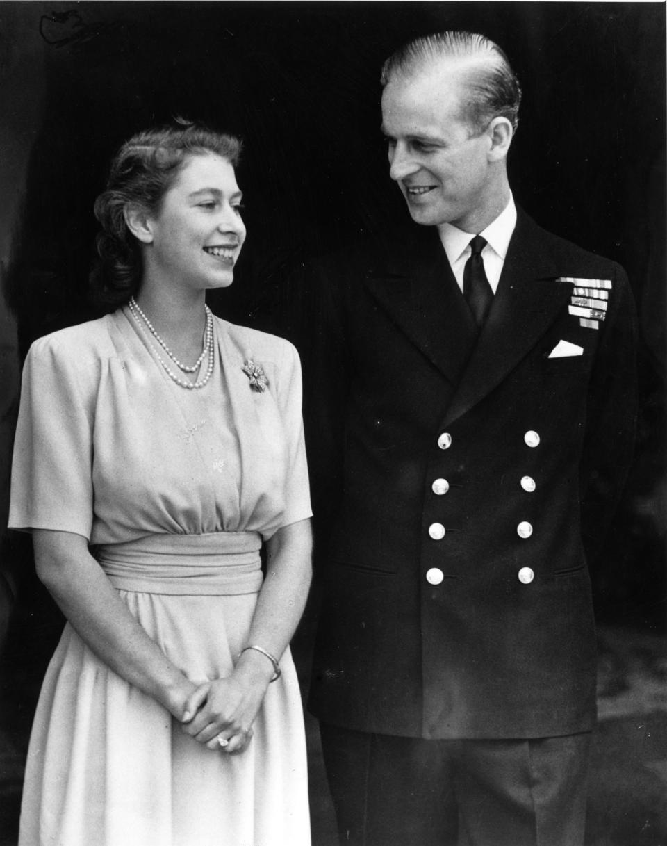 <p>The newly-engaged couple beamed at each other on July 10, 1947, almost a year after Prince Philip proposed in secret. Elizabeth's father, King George VI, asked for the public announcement be delayed until the princess's 21st birthday. Photo: Getty Images.</p> 