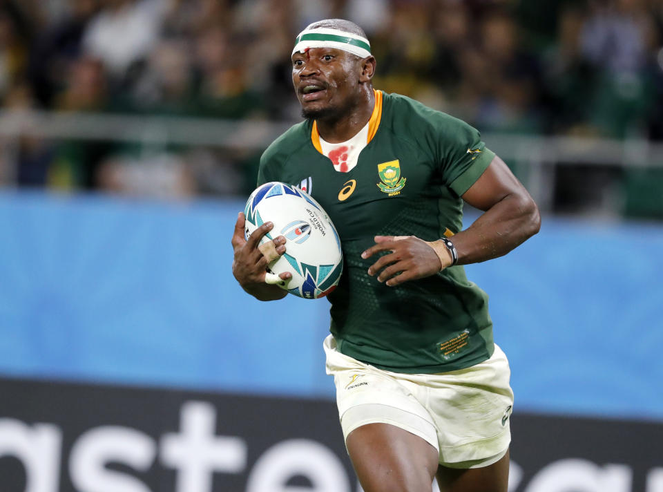 South Africa's Makazole Mapimpi runs in to score a try during the Rugby World Cup Pool B game at Shizuoka Stadium Ecopa between South Africa and Italy, in Shizuoka, Japan, Friday, Oct. 4, 2019. (AP Photo/Shuji Kajiyama)