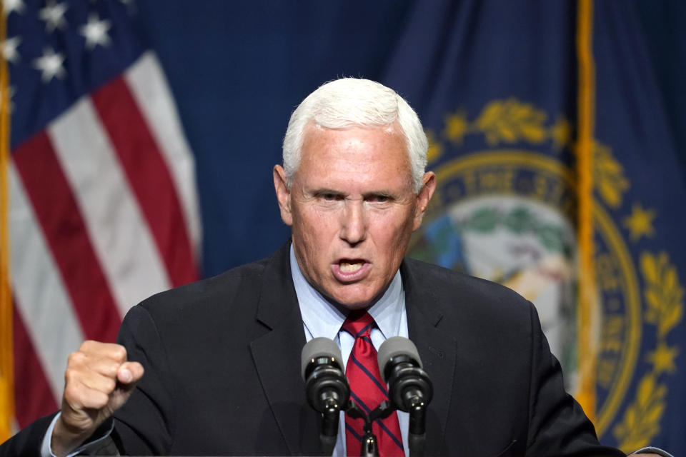 Former Vice President Mike Pence speaks at the annual Hillsborough County NH GOP Lincoln-Reagan Dinner, Thursday, June 3, 2021, in Manchester, N.H. (AP Photo/Elise Amendola)