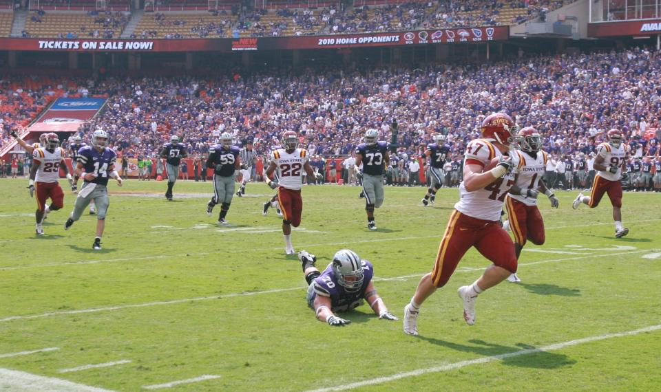 Iowa State's A.J. Klein outruns a diving Zach Hanson of Kansas State on his interception return for a touchdown during their game at Arrowhead Stadium in Kansas City on Sept. 18, 2010. Kansas State won 27-20.