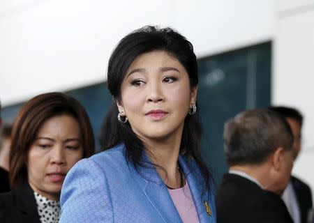 Ousted former Thai Prime Minister Yingluck Shinawatra arrives at the Supreme Court for a trial on criminal negligence looking into her role in a debt-ridden rice subsidy scheme during her administration, in Bangkok, Thailand February 17, 2016. REUTERS/Chaiwat Subprasom