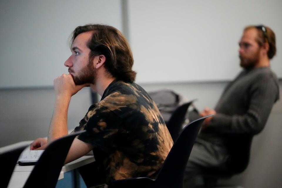 Austyn Smith, 19, of Westerville, listens to a lesson about nanofabrication during a micro-electro-mechanical systems fabrication class at Columbus State. The class provides training for future Intel jobs through Columbus State's Engineering Technologies Department.