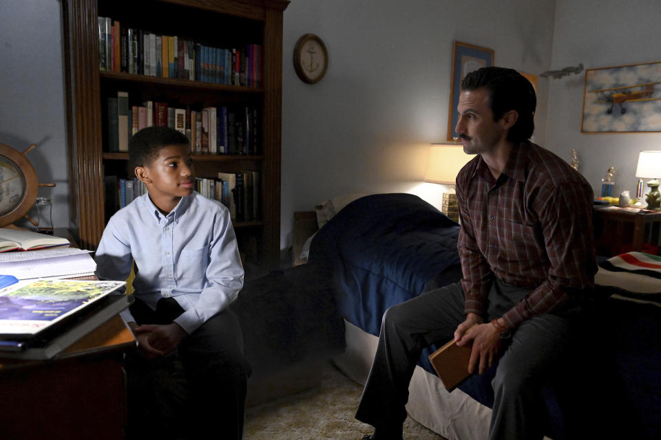 This image released by NBC shows Lonnie Chavis as Randall, left, and Milo Ventimiglia as Jack, in a scene from "This Is Us," airing on Tuesday at 9 p.m. EST. (Mitchell Haddad/NBC via AP)