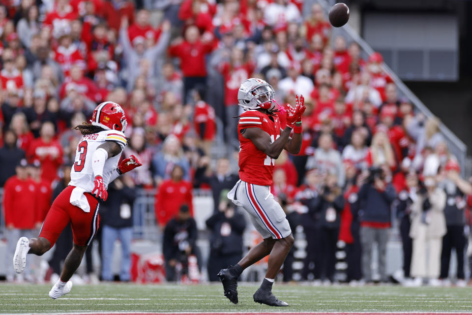 COLUMBUS, OH - OCTOBER 07: Ohio State Buckeyes wide receiver Marvin Harrison Jr. (18) makes a catch downfield ahead of Maryland Terrapins defensive back Ja'Quan Sheppard (3) during a college football game on October 7, 2023 at Ohio Stadium in Columbus, Ohio. (Photo by Joe Robbins/Icon Sportswire via Getty Images)