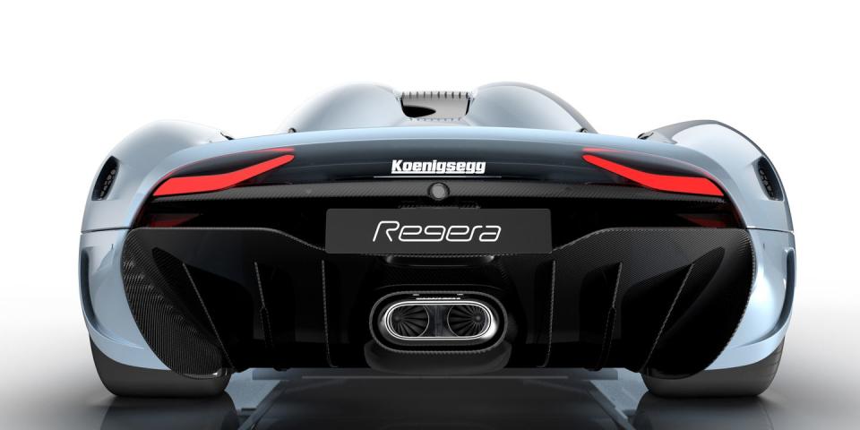 <p>That big pipe isn't actually the exhaust. The two fins jutting out of the diffuser and located on either side of the pipe are <a href="https://www.roadandtrack.com/car-shows/geneva-auto-show/news/a25167/koenigsegg-regera-hypercar-first-look-details/" rel="nofollow noopener" target="_blank" data-ylk="slk:the Regera;elm:context_link;itc:0;sec:content-canvas" class="link ">the Regera</a>'s exhaust tips. <a href="http://koenigsegg.com/regera/" rel="nofollow noopener" target="_blank" data-ylk="slk:Koenigsegg worked with Akrapovic;elm:context_link;itc:0;sec:content-canvas" class="link ">Koenigsegg worked with Akrapovic</a> to create this unique "fish tail" exhaust system that uses the flow of the exhaust to increase the car's downforce.</p>