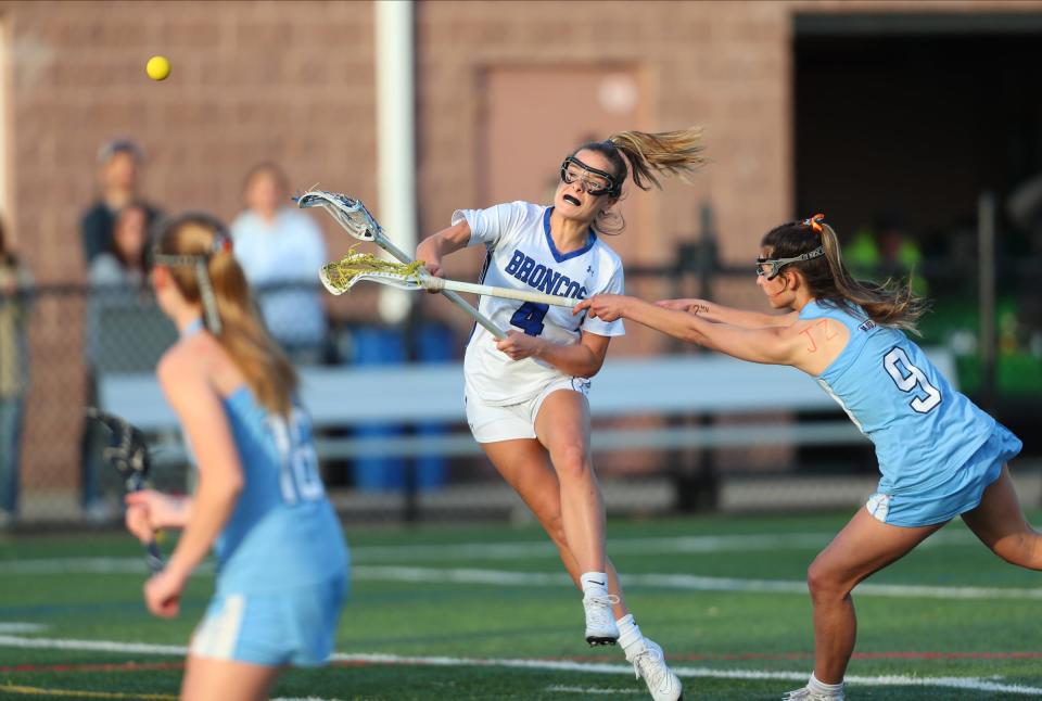 Bronxville's Molly Krestinski (4) piuts a shot on goal during their 16-7 win over Suffern in girls lacrosse action at Haindl Field in Eastchester on Friday, April 22, 2022.