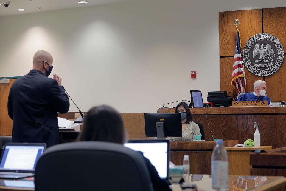Zach Jones, left, addresses Judge Douglas Driggers on May 25, 2022, during a status conference hearing in the Christopher Smelser case.