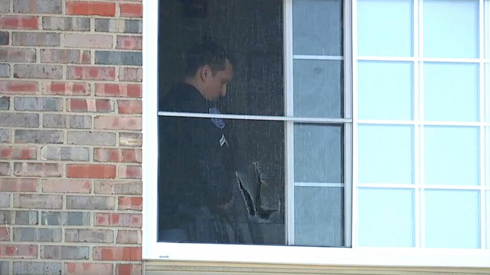 PHOTO: Police investigate an apartment in Warren, Michigan where an 8-year-old boy allegedly shot himself in the face with a handgun on April 19, 2024. (WXYZ)