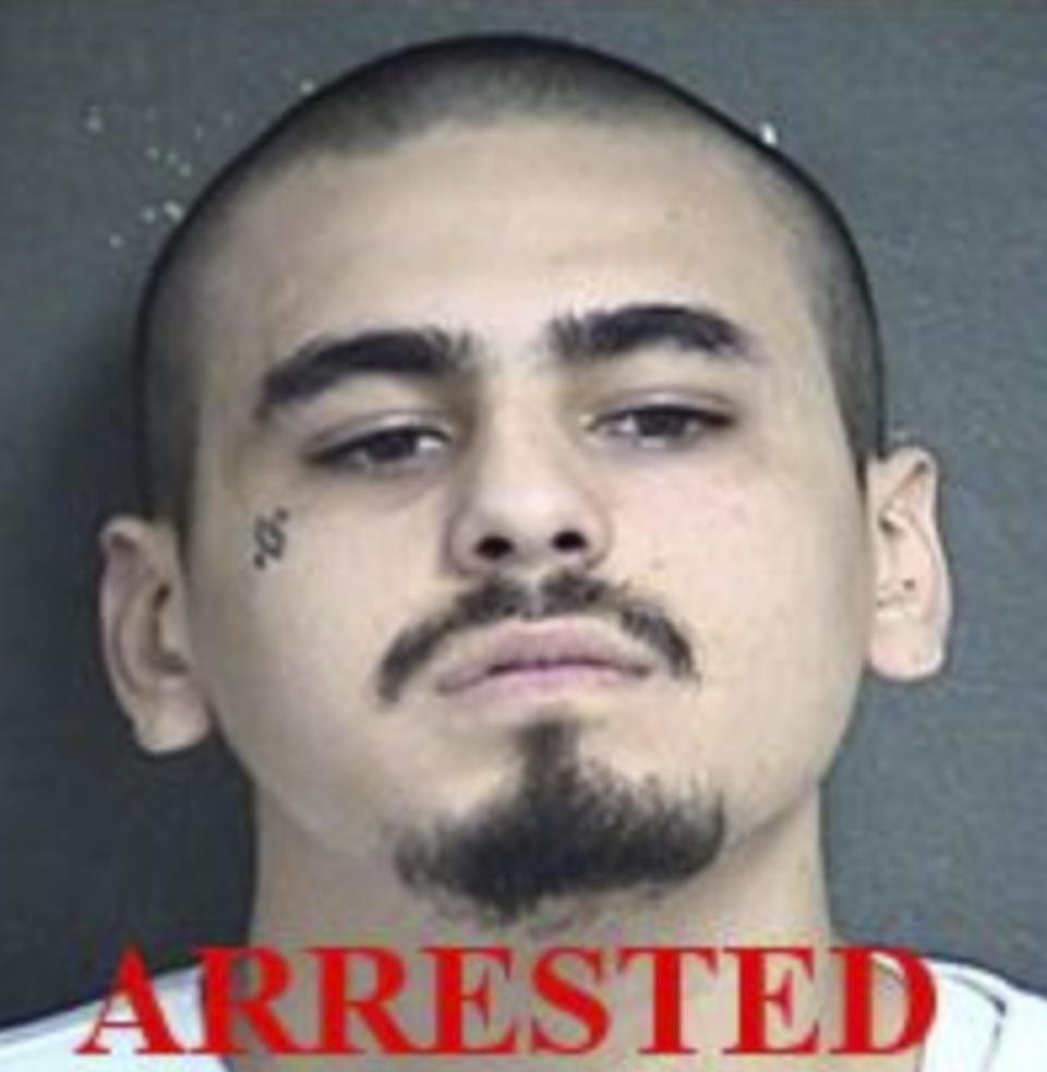 This undated photo provided by the Kansas City Kansas Police Department shows Javier Alatorre. Alatorre, one of the two men accused of opening fire inside a Kansas bar early Sunday, Oct. 6, 2019, was arrested Sunday afternoon while the other remained at large, police said. Alatorre and Hugo Villanueva-Morales were each charged with four counts of first-degree murder, police in Kansas City, Kansas, said in an early Monday, Oct. 7 release. (Kansas City Kansas Police Department via AP)