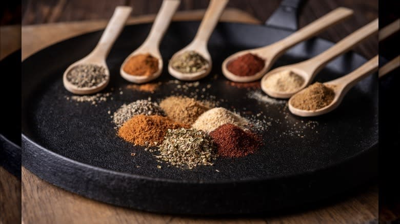 Spices and herbs on spoons