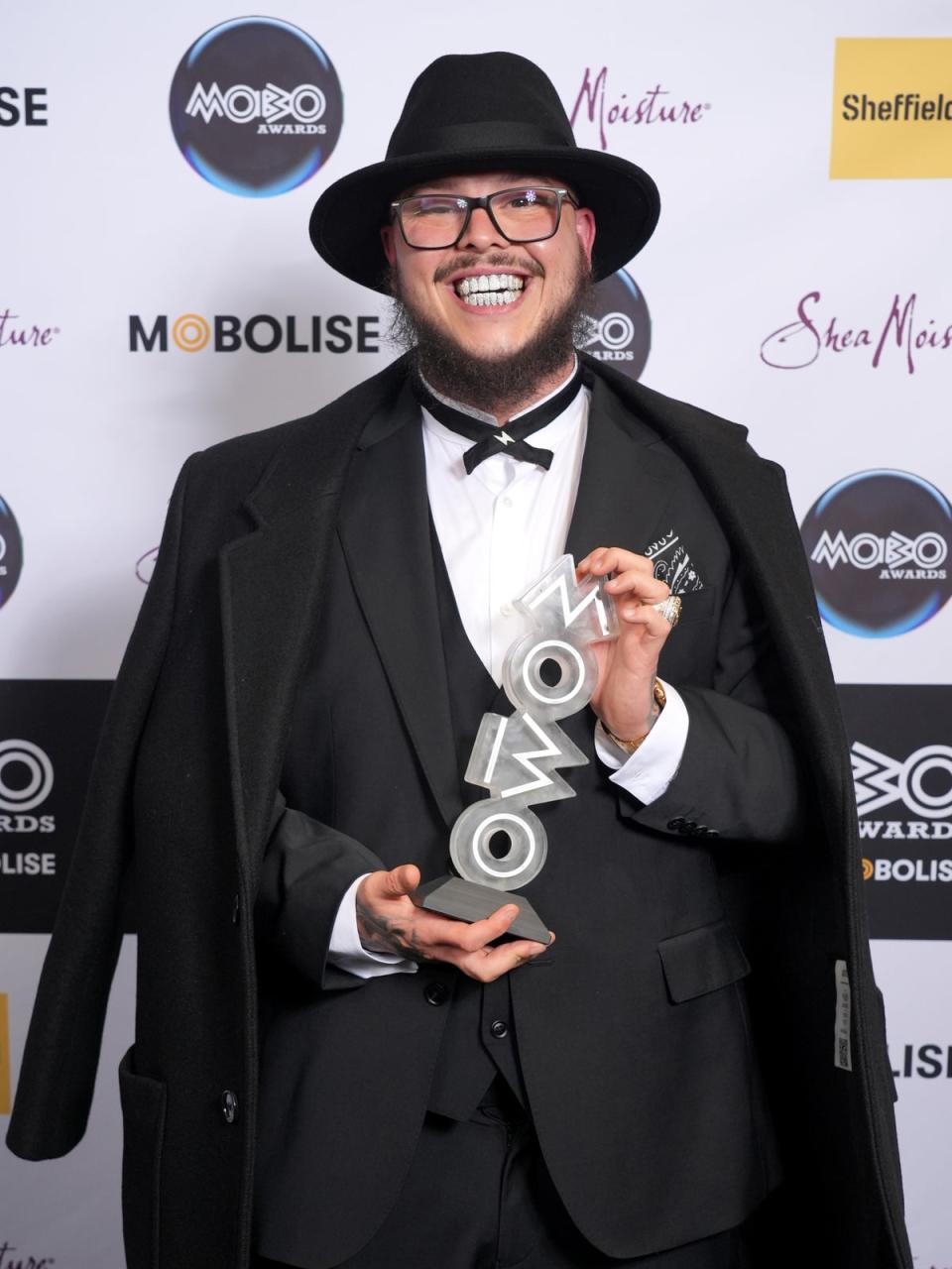 Potter Payper with his Album of the Year award (Getty Images For MOBO)