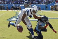 Indianapolis Colts wide receiver Michael Pittman Jr. (11) can't hold onto a pass as he is defended by Tennessee Titans cornerback Jackrabbit Jenkins (20) in the second half of an NFL football game Sunday, Sept. 26, 2021, in Nashville, Tenn. (AP Photo/Mark Zaleski)