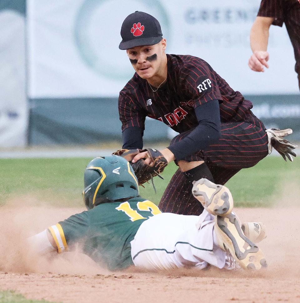 Milton's second baseman Ryan Kelley tags out King Philip runner Sean Sullivan in the MIAA Division 2 state championship game at Fitton Field in Worcester on Saturday, June 18, 2022.