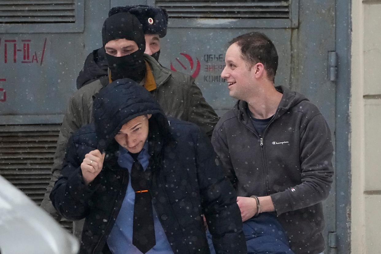 Wall Street Journal reporter Evan Gershkovich, right, is escorted from the Lefortovsky court in Moscow, Russia (AP)