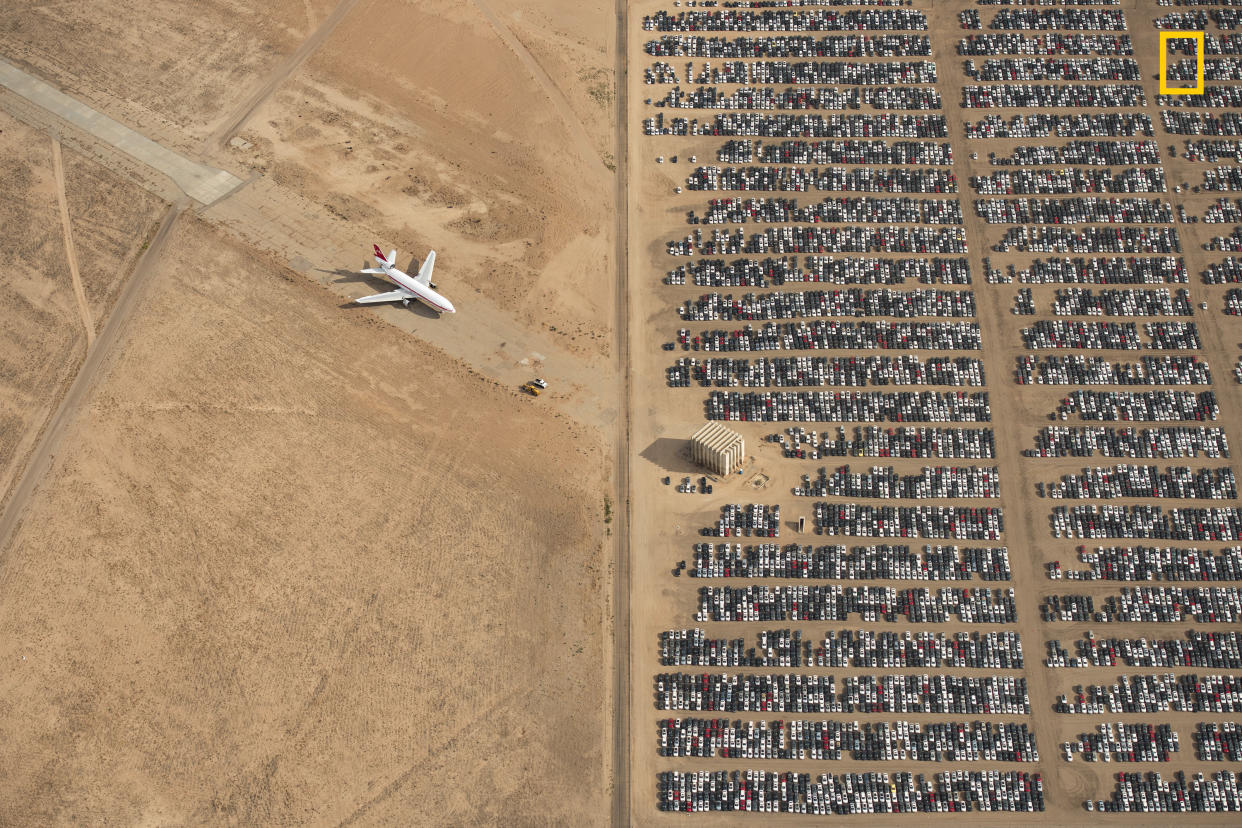 Grand Prize Winner - Thousands of Volkswagen and Audi cars sit idle in the middle of California&rsquo;s Mojave Desert. Models manufactured from 2009 to 2015 were designed to cheat emissions tests mandated by the U.S. Environmental Protection Agency. Following the scandal, Volkswagen recalled millions of cars. By capturing scenes like this one, I hope we will all become more conscious of and more caring toward our beautiful planet. (Photo: Jassen Todorov / 2018 National Geographic Photo Contest)