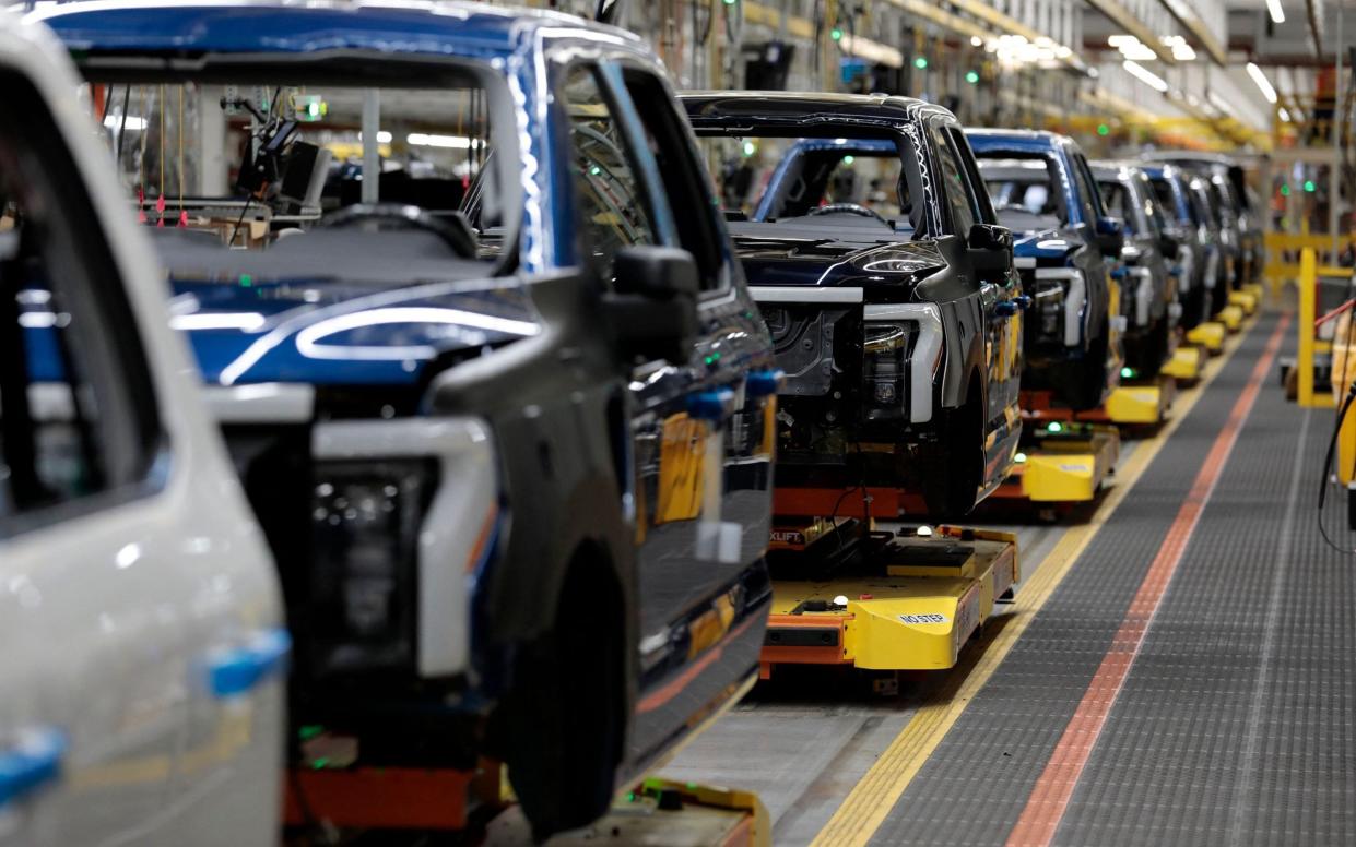 Ford Motor Company's electric F-150 Lightning on the production line at their Rouge Electric Vehicle Center in Dearborn, Michigan - JEFF KOWALSKY/AFP via Getty Images