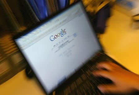 A laptop screen shows the homepage of Google.cn. in Beijing in this file photo taken on June 8, 2006. REUTERS/Jason Lee