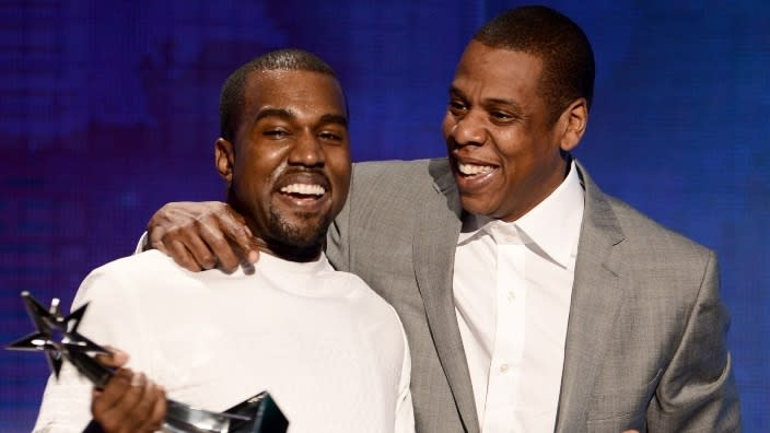 In this July 2012 photo, rappers Kanye West (left) and Jay-Z (right) accept the Best Group Award during the 2012 BET Awards at The Shrine Auditorium in Los Angeles. (Photo by Michael Buckner/Getty Images For BET)