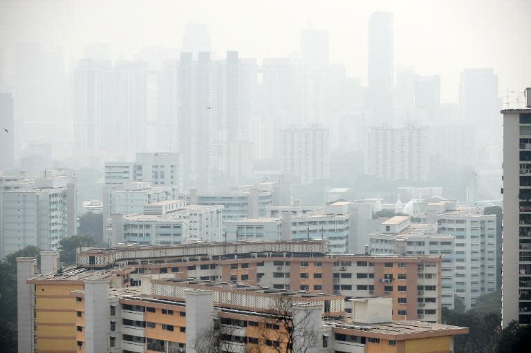 Singapore's financial business district is pictured shrouded in smog on September 15, 2014