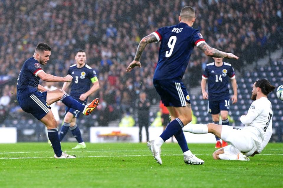 John McGinn (left) scores Scotland’s first equaliser in the Israel match (Jane Barlow/PA) (PA Wire)