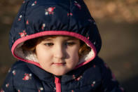 Elena, who is two years and seven-months old, and the eldest daughter of Maria and Adi, plays in Hampstead Heath in London, Britain, February 3, 2019. REUTERS/Alecsandra Dragoi