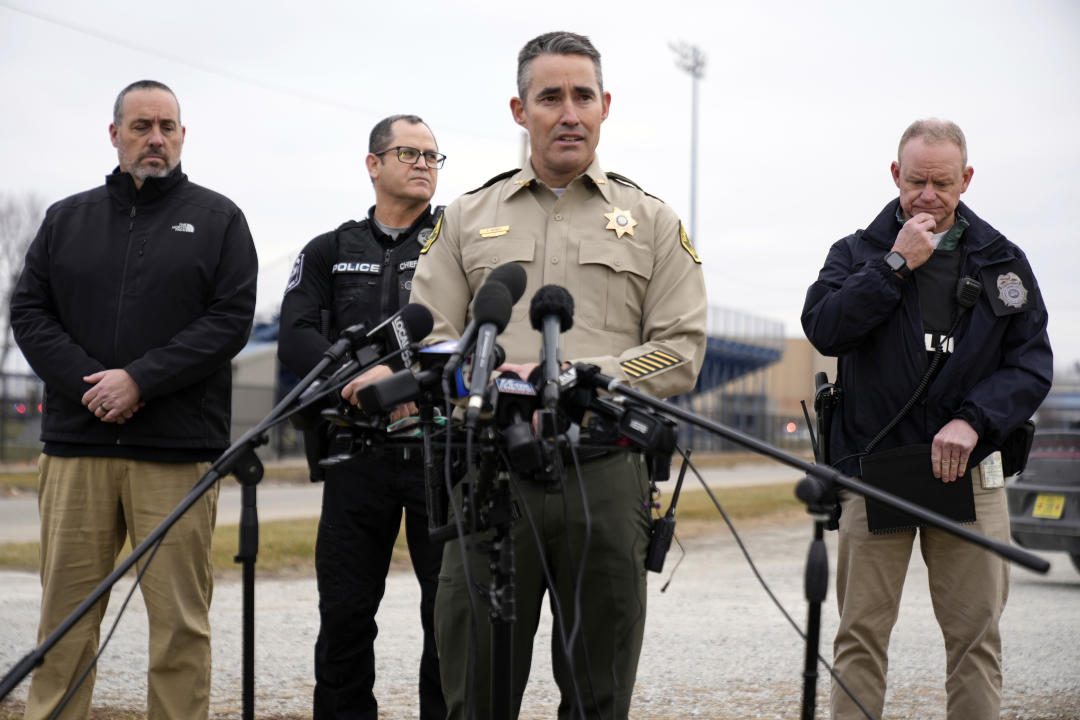 Dallas County (Iowa) Sheriff Adam Infante speaks outside Perry High School in Perry, Iowa., Thursday. (Andrew Harnik/AP)
