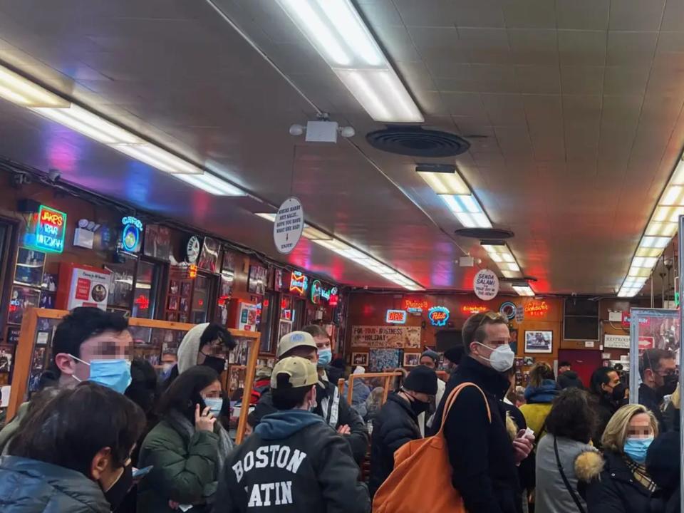 A crowd of people inside Katz's Deli in Manhattan.