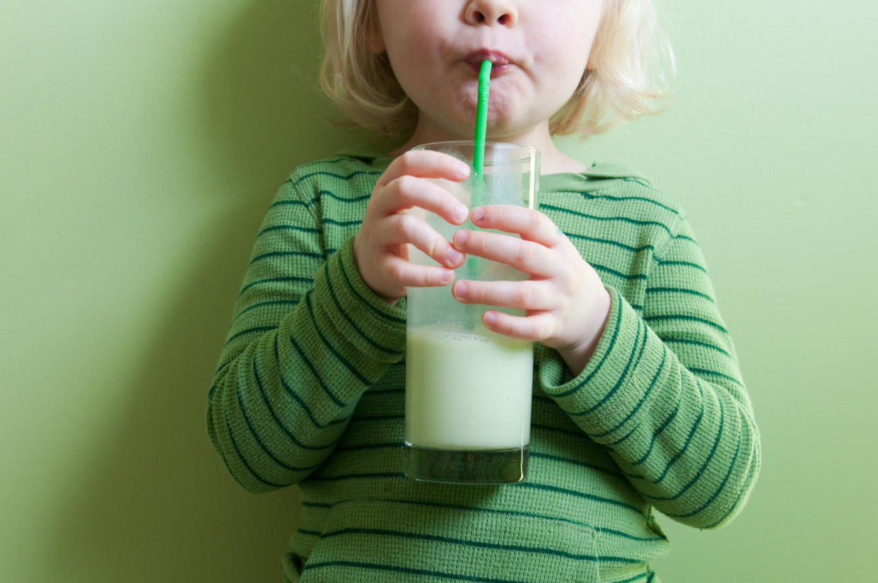 Children who drink full-fat milk are less likely to be overweight, research has suggested (Getty)