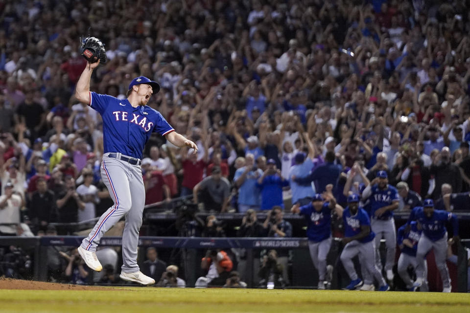 Texas Rangers relief pitcher Josh Sborz celebrates after winning Game 5 of the baseball World Series against the Arizona Diamondbacks Wednesday, Nov. 1, 2023, in Phoenix. The Rangers won 5-0 to win the series 4-1. (AP Photo/Godofredo A. Vásquez)