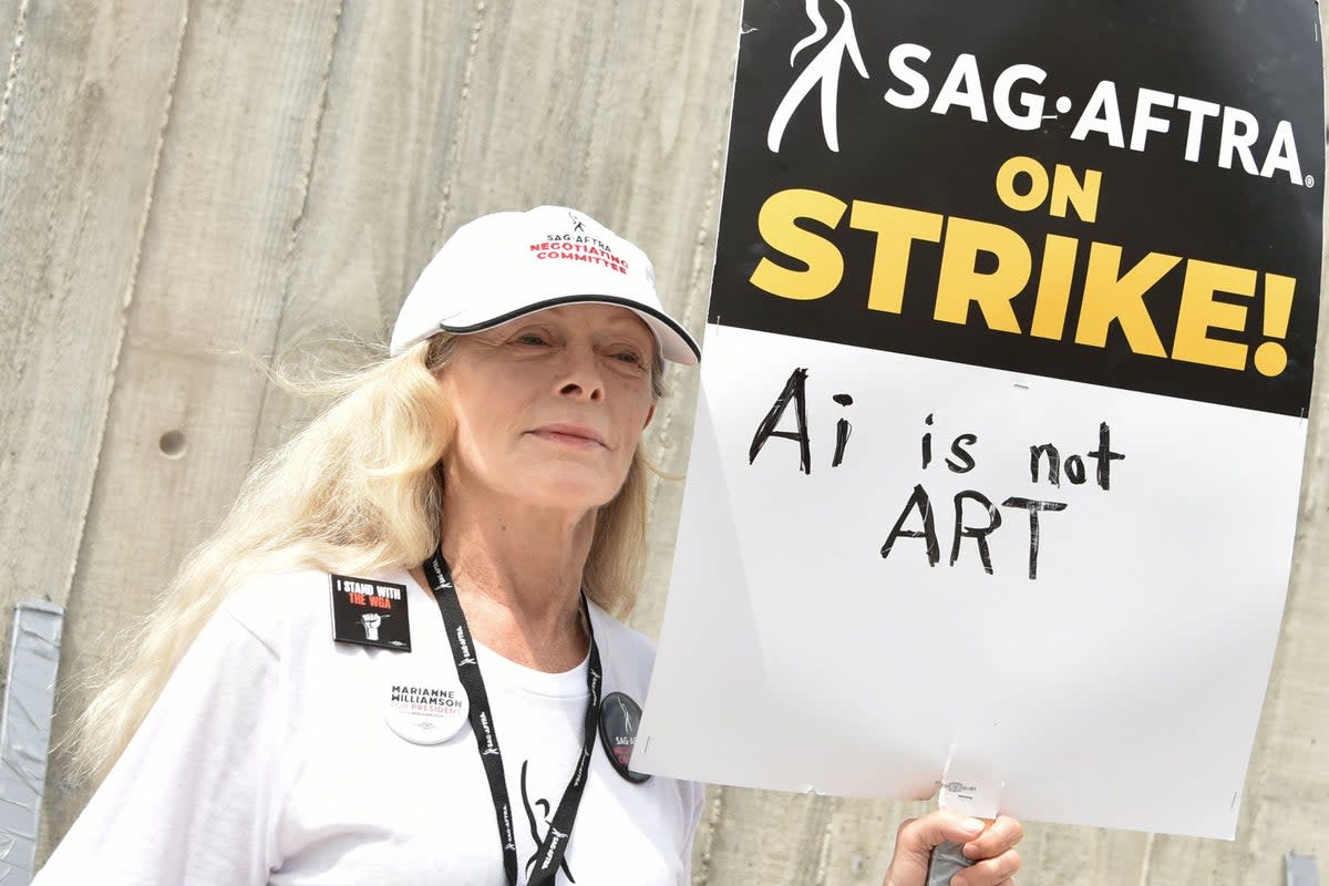 Tom Murray meets ‘Titanic’ star Frances Fisher on the picket line  (AFP via Getty )