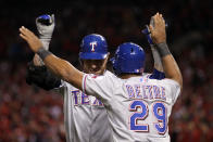 ST LOUIS, MO - OCTOBER 27: Josh Hamilton #32 of the Texas Rangers celebrates with Adrian Beltre #29 after hitting a two-run home run in the 10th inning during Game Six of the MLB World Series against the St. Louis Cardinals at Busch Stadium on October 27, 2011 in St Louis, Missouri. (Photo by Ezra Shaw/Getty Images)