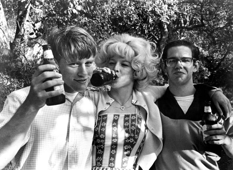 From left: Ron Howard, Candy Clark and Charles Martin Smith on ‘American Graffiti’ set in 1973