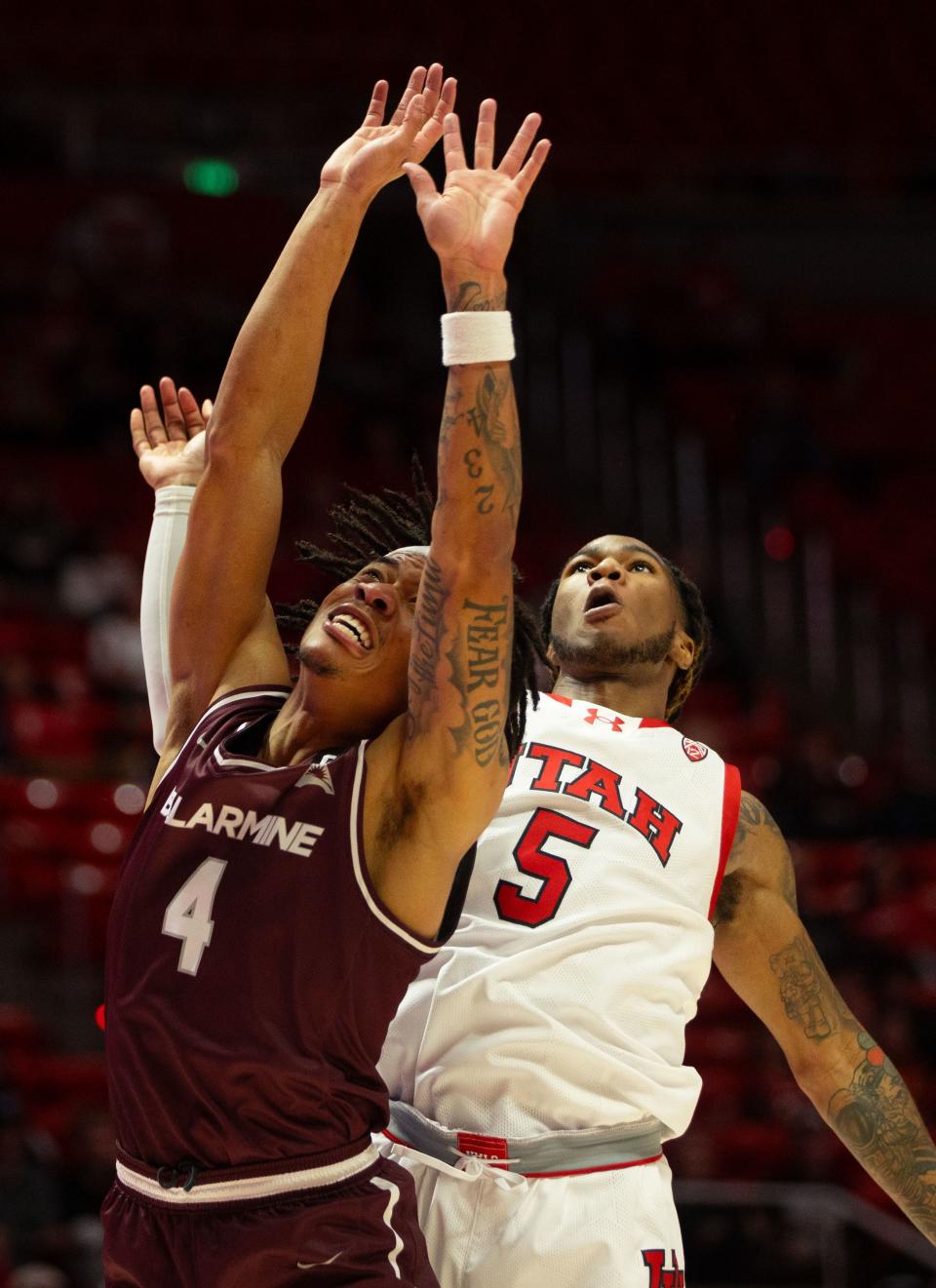 Bellarmine Knights guard Dezmond McKinney (4) and Utah Utes guard Deivon Smith (5) during the men’s college basketball game between the University of Utah and Bellarmine University at the Jon M. Huntsman Center in Salt Lake City on Wednesday, Dec. 20, 2023. | Megan Nielsen, Deseret News