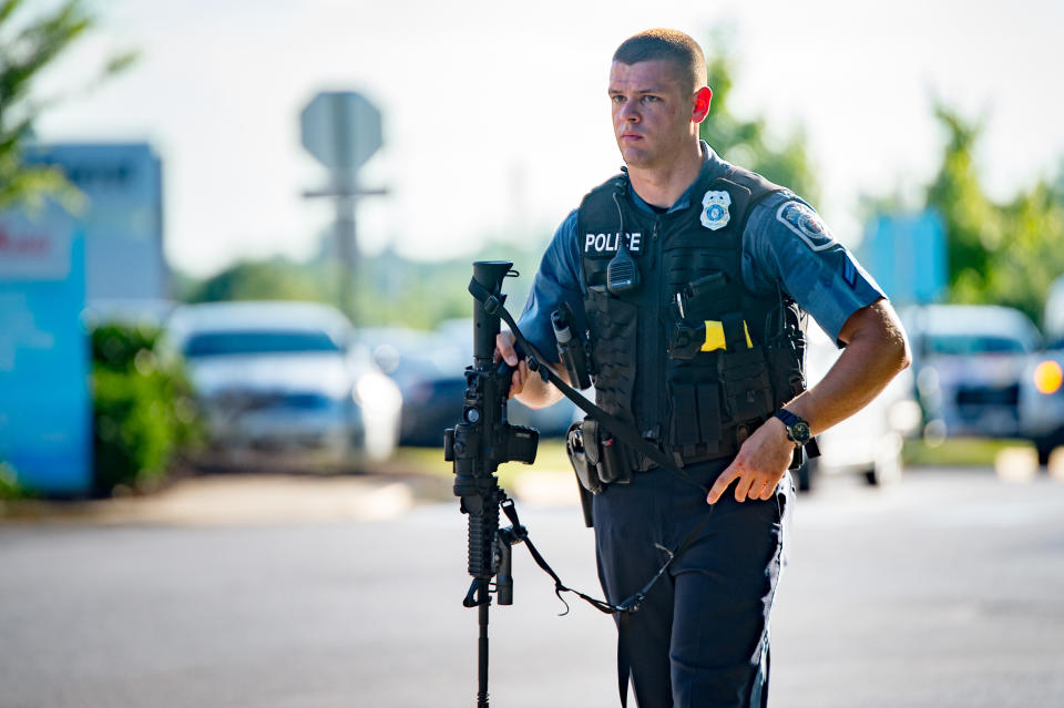 <p>A police official works the scene of a shooting at the Capital Gazette newspaper building in Annapolis, Md., on Thursday, June 28, 2018. (Photo: Michael Jordan via ZUMA Wire) </p>