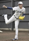Japanese pitcher Roki Sasaki works out during a team camp of the World Baseball Classic, in Miyazaki, southern Japan, on Feb. 19, 2023. All eyes will be on Japanese baseball pitcher Sasaki at the World Baseball Classic. He is regarded as the next big thing in baseball out of Japan. (Kyodo News via AP)