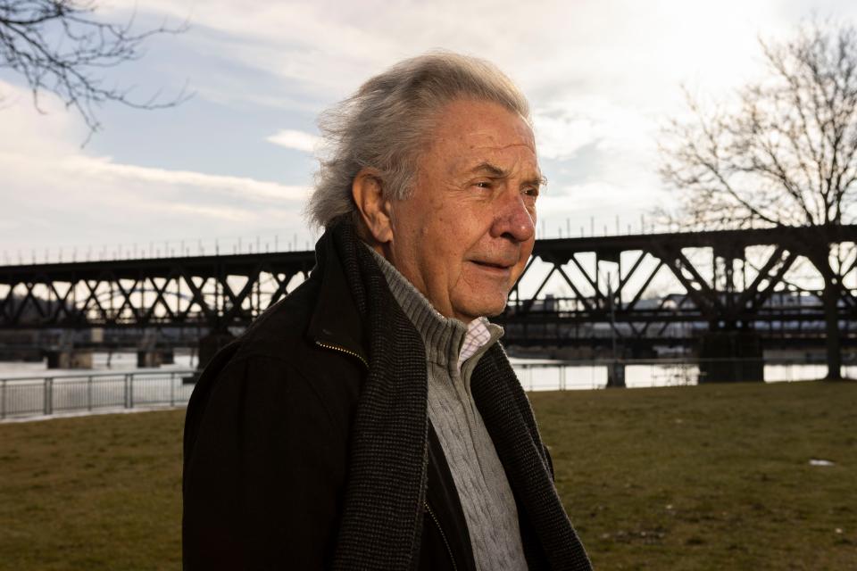 Former General Assembly candidate Gerald Podraza poses for a portrait in front of railroad tracks located in downtown Rockford on Nov. 30, 2023 in David Park.