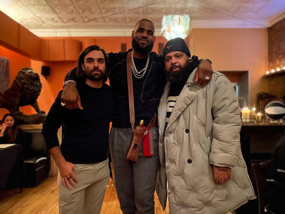 LeBron James (center) with Sheron Barber (right)