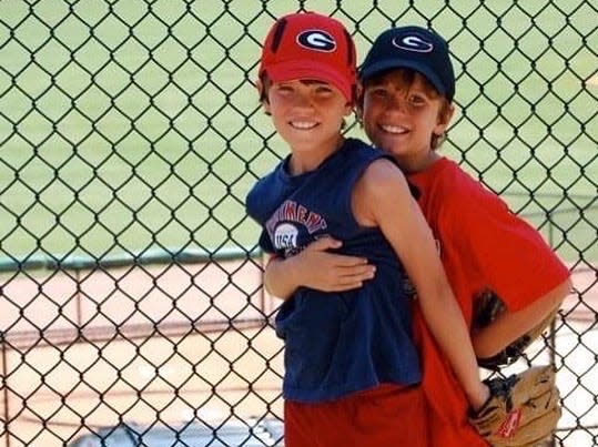 Chris and Stefan Caray in their childhood days.