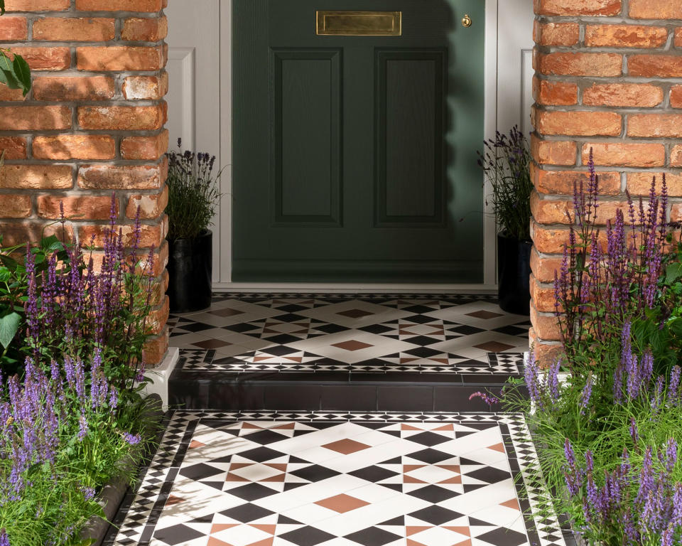 <p> Making a cheap DIY garden path in a front garden should focus on visual impact and curb appeal. If you live in a period property, nothing beats a beautifully tiled path leading to the front door.  </p> <p> But original and reproduction porcelain tiles can break the bank, and installing them can be very costly if you have to hire someone to do it for you. However, if you're good at DIY and want to create this timeless look for less, you could focus your attention on a smaller area, such as the step and the area immediately in front of the door.  </p> <p> This will cut costs and allow you to fill out the rest of the path with a less-expensive material, such as gravel. Choose a gravel color to tone in neatly with the tiling, then make sure you add some good path lighting along the length of your walkway so you get the full benefit of the statement pattern during the day and after dark.  </p>